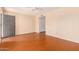 Bright living room with wood-look floors and ceiling fan at 7950 E Keats Ave # 130, Mesa, AZ 85209