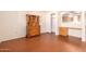 Dining area with wood flooring and built-in hutch at 7950 E Keats Ave # 130, Mesa, AZ 85209