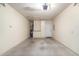 Garage with storage cabinets and door at 7950 E Keats Ave # 130, Mesa, AZ 85209