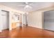 Bright bedroom with wood floors and ceiling fan at 7950 E Keats Ave # 130, Mesa, AZ 85209