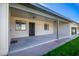Side view of the house with covered patio at 7950 E Keats Ave # 130, Mesa, AZ 85209
