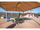 Relaxing area near tennis courts with tables and shade at 7950 E Keats Ave # 130, Mesa, AZ 85209