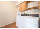 Laundry room with washer, dryer and cabinets at 7950 E Keats Ave # 130, Mesa, AZ 85209