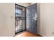 Front entry door with security gate leading into the home at 7950 E Keats Ave # 130, Mesa, AZ 85209