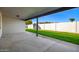 Covered patio overlooking grassy backyard at 7950 E Keats Ave # 130, Mesa, AZ 85209