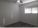 Well-lit bedroom featuring a window and laminate floors at 1502 W Shangri La Rd, Phoenix, AZ 85029