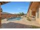 Inviting pool and spa area with a water feature at 18029 W San Miguel Ave, Litchfield Park, AZ 85340