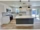 Modern kitchen with white shaker cabinets and quartz countertops at 2213 E Janice Way, Phoenix, AZ 85022