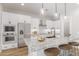 Modern kitchen with stainless steel appliances and an island at 23117 E Reins Rd, Queen Creek, AZ 85142