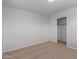 Bedroom with sliding closet doors and neutral decor at 45680 W Barbara Ln, Maricopa, AZ 85139