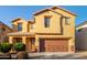 Two-story home with a two-car garage and well-maintained landscaping at 45680 W Barbara Ln, Maricopa, AZ 85139