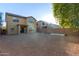 Large backyard with gravel landscaping and raised garden beds at 45680 W Barbara Ln, Maricopa, AZ 85139