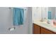 Clean bathroom with wood vanity and a towel bar at 45680 W Barbara Ln, Maricopa, AZ 85139
