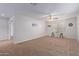 Game room with carpet, ceiling fan, and dartboard at 45680 W Barbara Ln, Maricopa, AZ 85139