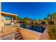 Stunning pool with spacious patio and waterfall feature at 6231 W Shannon St, Chandler, AZ 85226