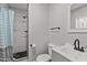 Clean bathroom with shower stall, toilet and vanity at 56701 N Cope Rd, Wickenburg, AZ 85390