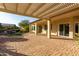 Covered patio with pergola, access to the house at 16513 W Windsor Ave, Goodyear, AZ 85395