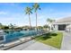 Waterfront patio with grassy area and lake views at 160 N Shore Ln, Gilbert, AZ 85233