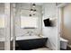 Elegant bathroom featuring a modern bathtub and marble finishes at 160 N Shore Ln, Gilbert, AZ 85233