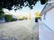 Side yard view with grassy area and trees at 4936 E Coronado Rd, Phoenix, AZ 85008