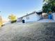 Backyard view of house and grassy area at 4936 E Coronado Rd, Phoenix, AZ 85008