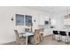 Kitchen dining area with a rustic table and chairs at 17209 W Wildwood St, Surprise, AZ 85388