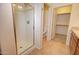 Bathroom with a walk-in shower, toilet, and access to a large closet at 846 N Pueblo Dr # 111, Casa Grande, AZ 85122