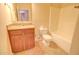 Clean bathroom with granite countertop, toilet, and bathtub at 846 N Pueblo Dr # 111, Casa Grande, AZ 85122