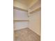 Spacious walk-in closet with double rods and neutral carpeting at 846 N Pueblo Dr # 111, Casa Grande, AZ 85122