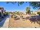 Landscaped community view with walkways and desert landscaping at 846 N Pueblo Dr # 111, Casa Grande, AZ 85122