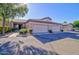 Well-maintained property with a two-car garage and desert landscaping at 846 N Pueblo Dr # 111, Casa Grande, AZ 85122