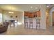 Kitchen features wood cabinets, granite countertops, and stainless steel appliances at 846 N Pueblo Dr # 111, Casa Grande, AZ 85122