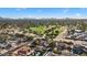 Aerial view showing home's location near park and mountains at 16008 N 56Th Way, Scottsdale, AZ 85254