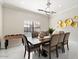 Formal dining room with a large table, foosball table and gold wall decor at 16008 N 56Th Way, Scottsdale, AZ 85254
