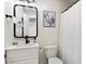 Clean bathroom with toilet, vanity, and shower; simple and bright decor at 16008 N 56Th Way, Scottsdale, AZ 85254