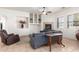Living area with built-in shelving and fireplace at 2914 E Gary Way, Phoenix, AZ 85042