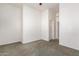 Bright bedroom with neutral carpeting and ample closet space at 2914 E Gary Way, Phoenix, AZ 85042