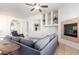 Living room featuring a built-in entertainment center and fireplace at 2914 E Gary Way, Phoenix, AZ 85042