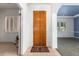 Interior entryway with wood door and tile flooring at 2914 E Gary Way, Phoenix, AZ 85042