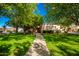 One-story house with a lush green lawn and a walkway at 2914 E Gary Way, Phoenix, AZ 85042
