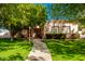 House with a nicely landscaped front yard and a walkway at 2914 E Gary Way, Phoenix, AZ 85042