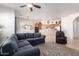 Open living and kitchen area with a large sectional sofa at 2914 E Gary Way, Phoenix, AZ 85042