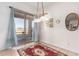 Bright dining area with tile floors and access to a patio at 2914 E Gary Way, Phoenix, AZ 85042