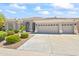 Two-story home with attached garage and manicured landscaping at 18221 N 53Rd St, Scottsdale, AZ 85254