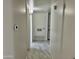Clean hallway with tile flooring at 3637 W Myrtle Ave, Phoenix, AZ 85051