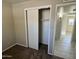 Bedroom closet with sliding doors and shelving at 3637 W Myrtle Ave, Phoenix, AZ 85051