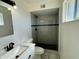 Updated bathroom with modern vanity and shower at 3637 W Myrtle Ave, Phoenix, AZ 85051