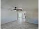Bright living room with tile floors and ceiling fan at 3637 W Myrtle Ave, Phoenix, AZ 85051