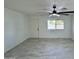 Living room featuring tile floors and a view of the front yard at 3637 W Myrtle Ave, Phoenix, AZ 85051