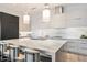 Modern kitchen with marble countertops, high-end appliances, and an island at 6921 N Joshua Tree Ct, Paradise Valley, AZ 85253
